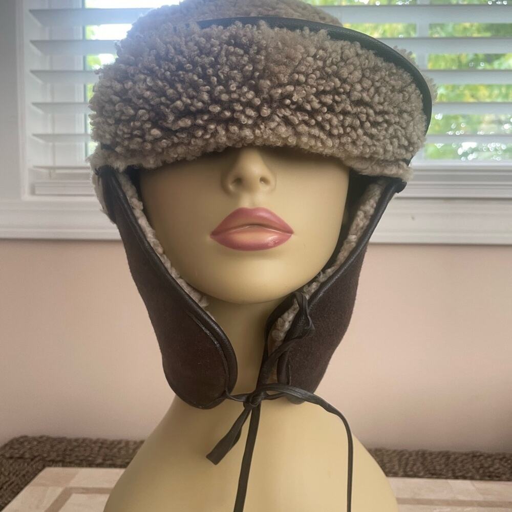 Sheepskin trapper hat. Leather chin ties